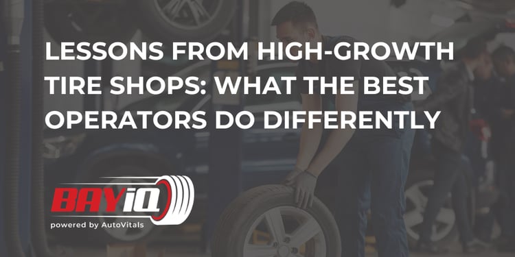 person rolling tire in tire shop
