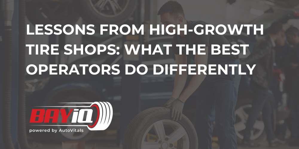 person rolling tire in tire shop